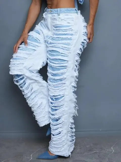 un jean blanc et bleu clair — photo 3